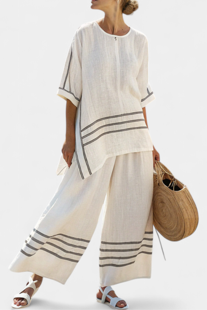 Complete with wide striped pants with irregular cut - modern and comfortable style