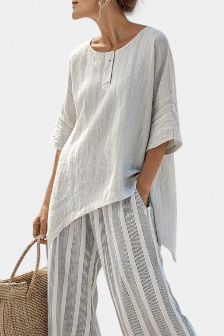 Daisy Set of Asymmetrical Blouse and Striped Pants for a Modern and Elegant Style