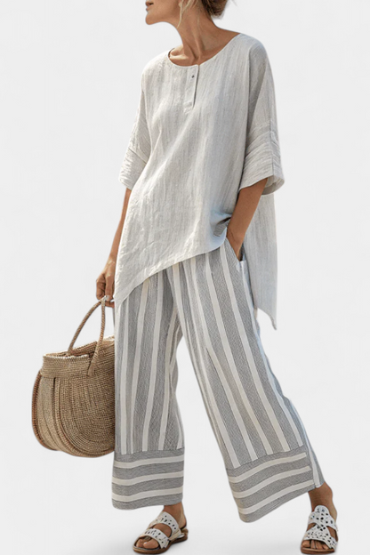 Daisy Set of Asymmetrical Blouse and Striped Pants for a Modern and Elegant Style